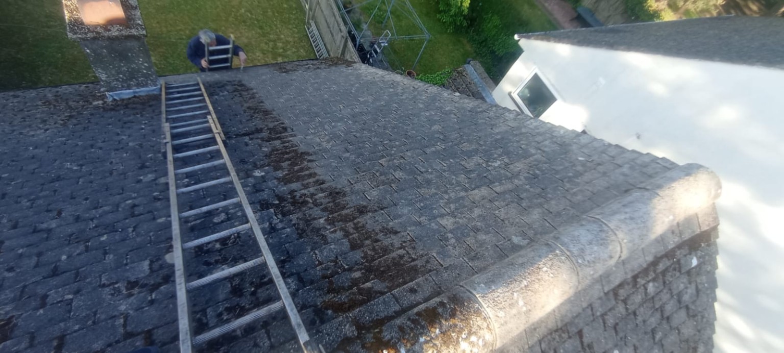 Aerial view of roof cleaning in progress — moss removal Tadley Hampshire