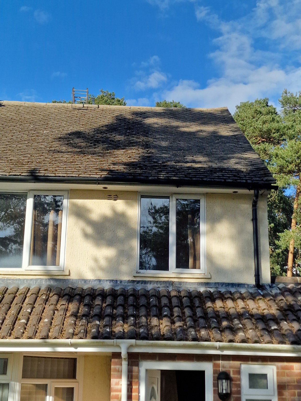 Close-up of repointing work on residential roof Hampshire