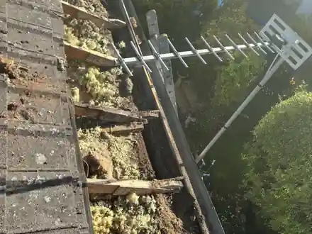 Roof eaves opened up to repair rotten timber on a house in Basingstoke, Hampshire